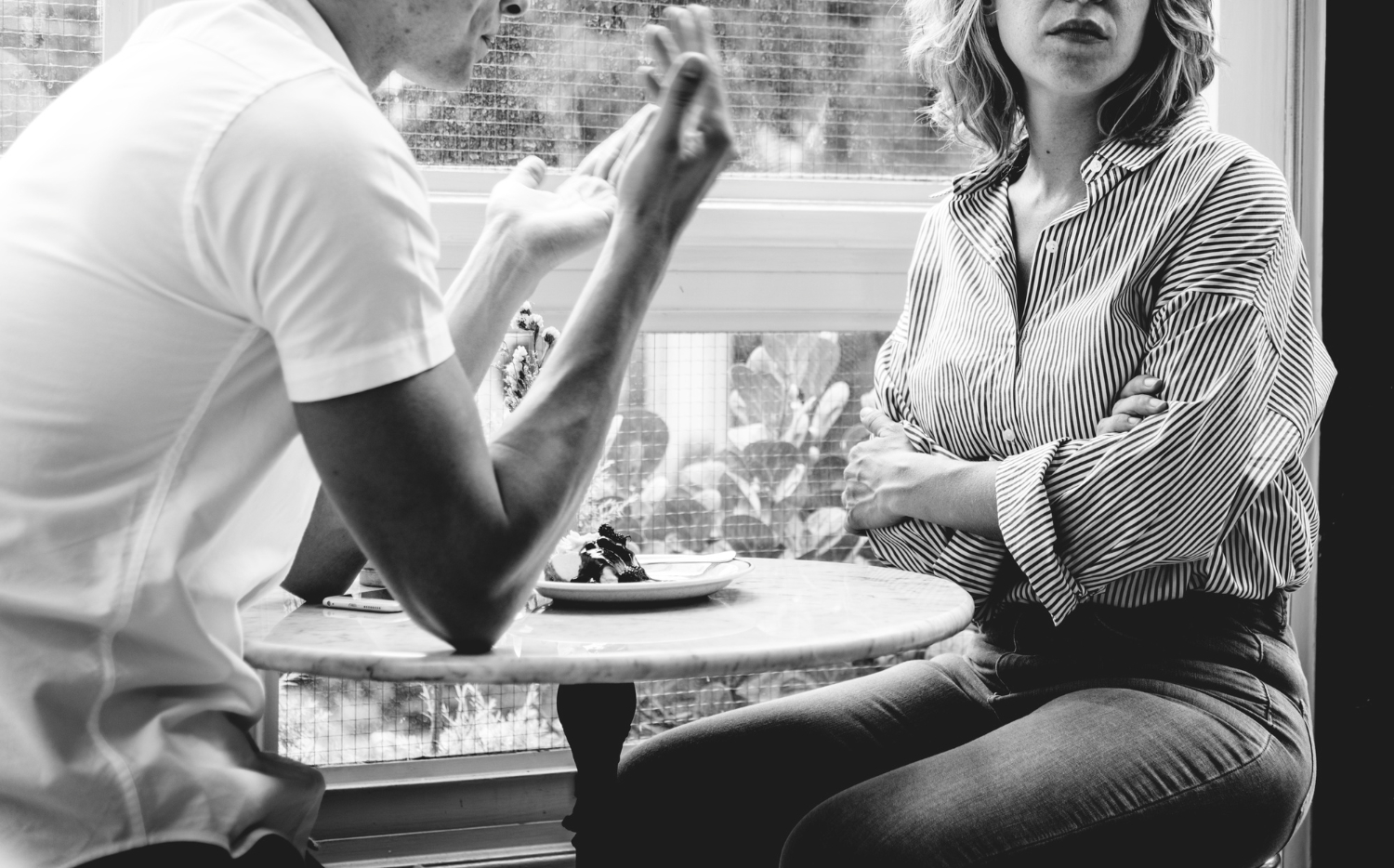 couple having argument cafe